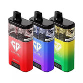 Three disposable vape devices with a transparent body and a black top, available in red, blue, and green colors, each featuring the Crystal brand logo.