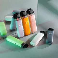 A collection of Voopoo Vinci Q Pod devices in various colors, featuring a sleek, modern design with a visible liquid chamber and a pod cartridge inserted in each device.
